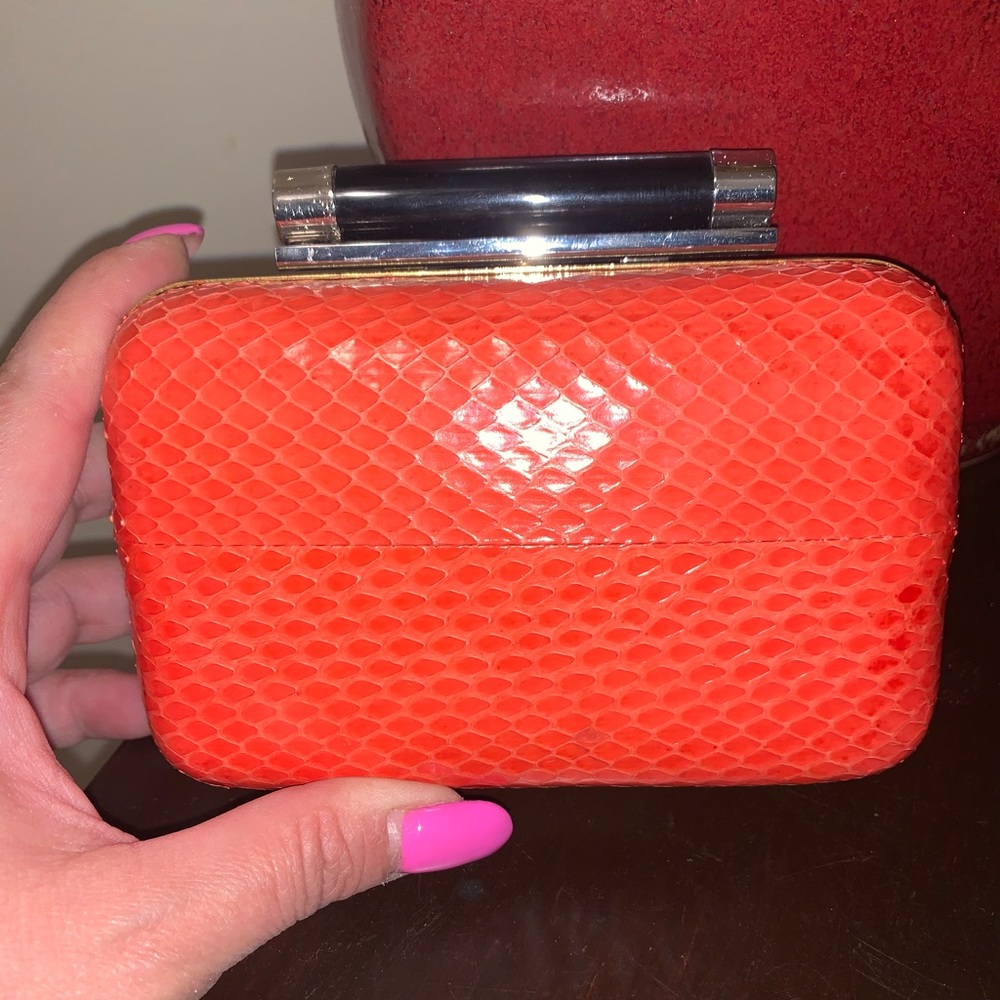 DVF Tonda orange hibiscus snakeskin clutch bag